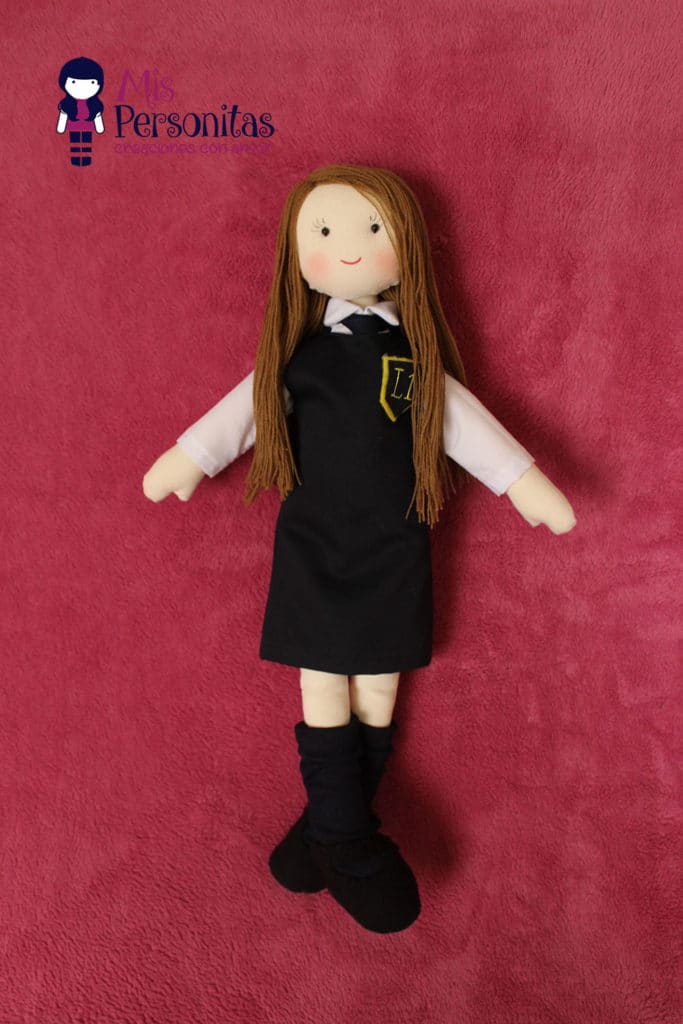 Muñeca de tela escolar