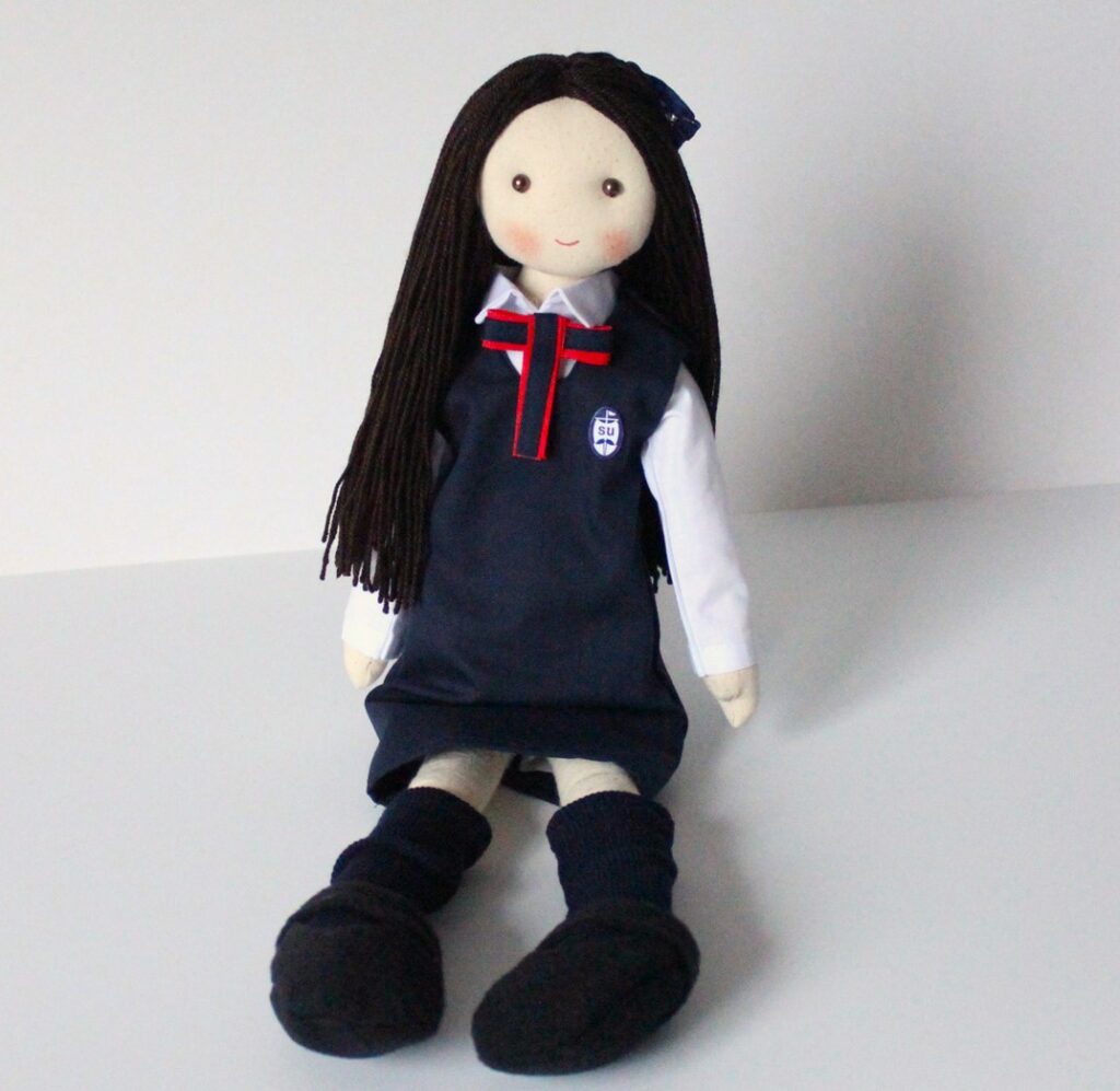 muñeca escolar
