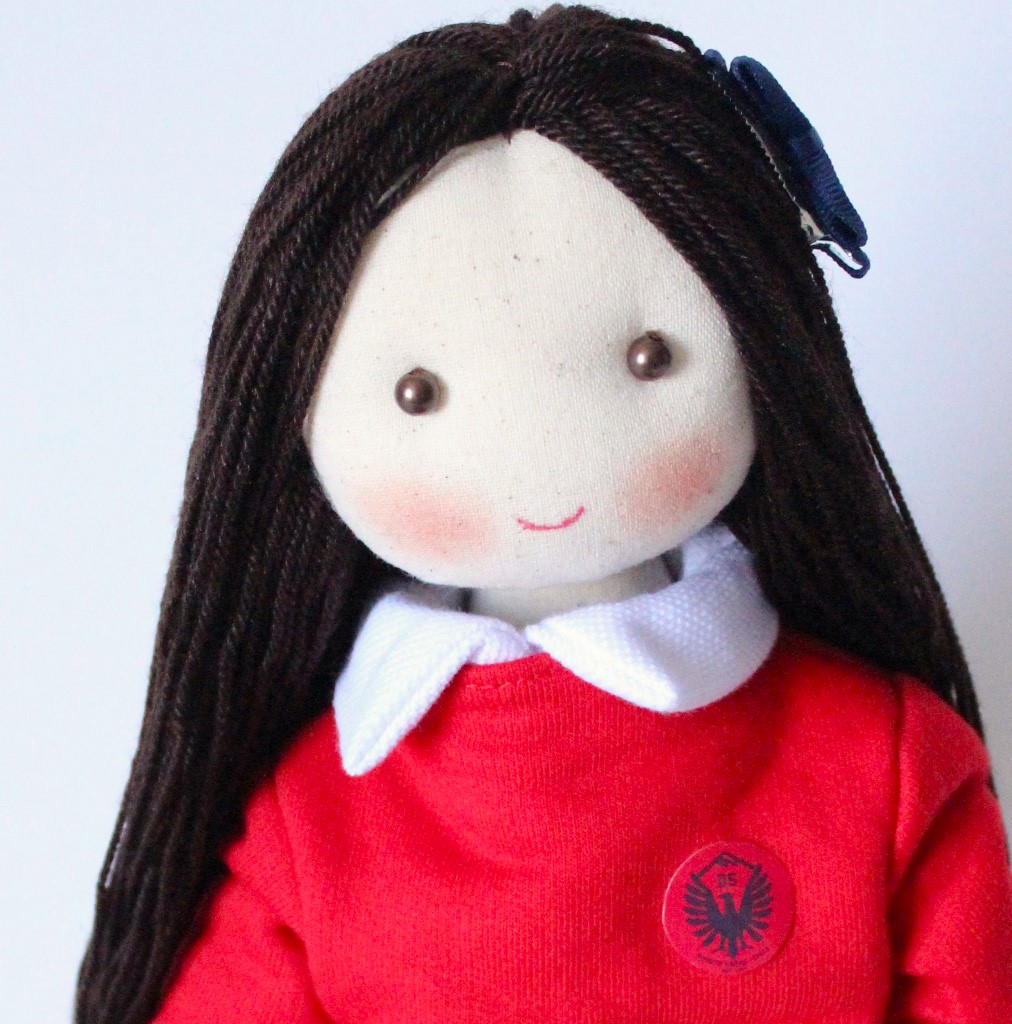 muñeca escolar