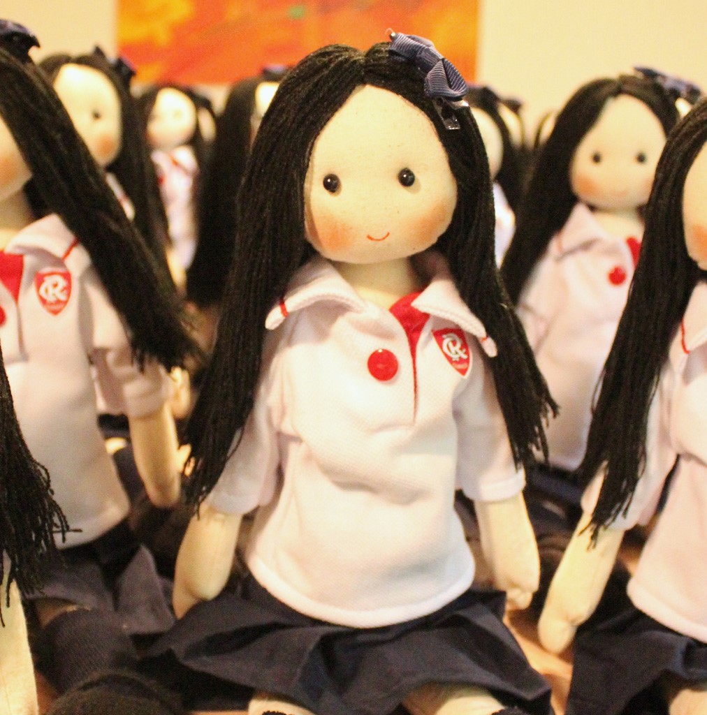 muñecas escolares